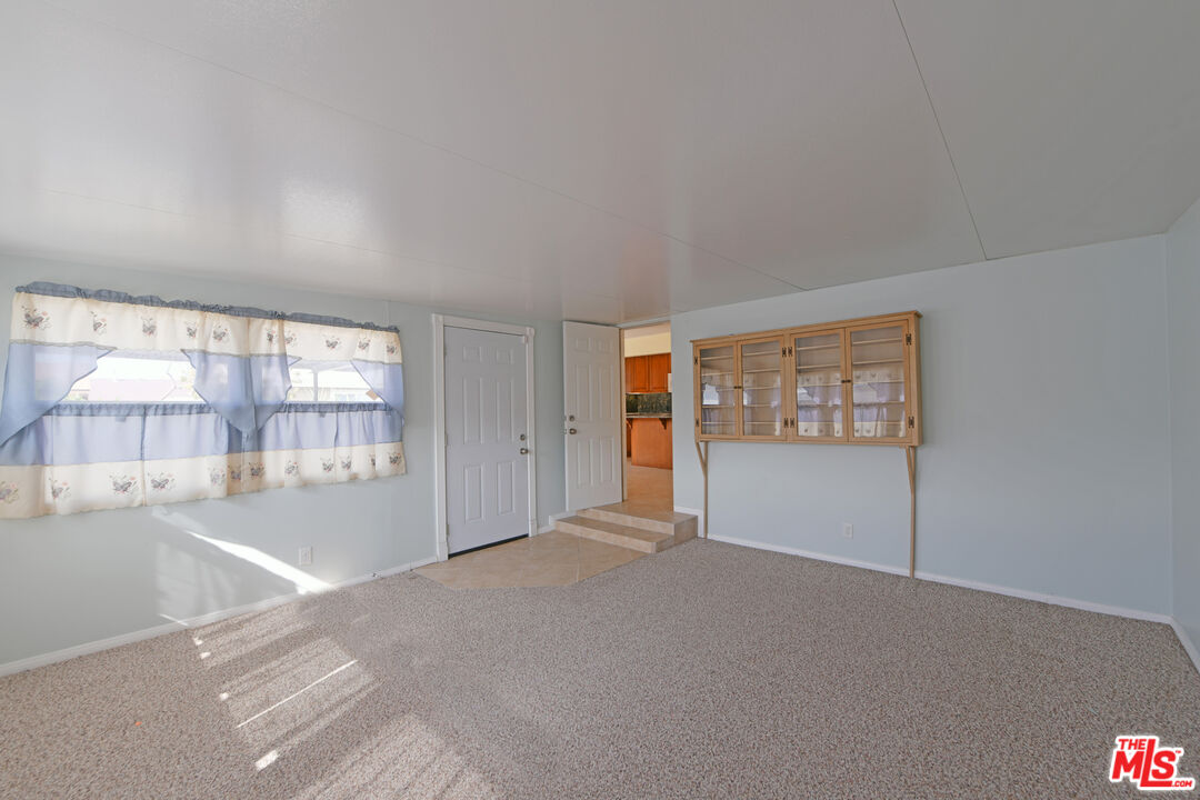11676 Ranchito Street El Monte, CA 91732 - Photo 22 of 27 a view of an empty room with a window