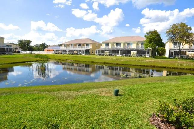 a view of a swimming pool with a lake view