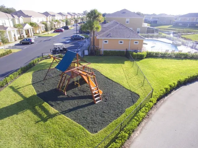 a view of a park with swings