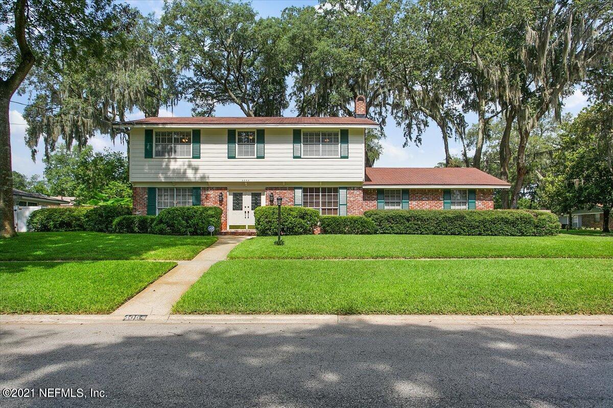 4064 Heath Road Jacksonville, FL 32277 - Photo 1 of 23 a front view of a house with a yard