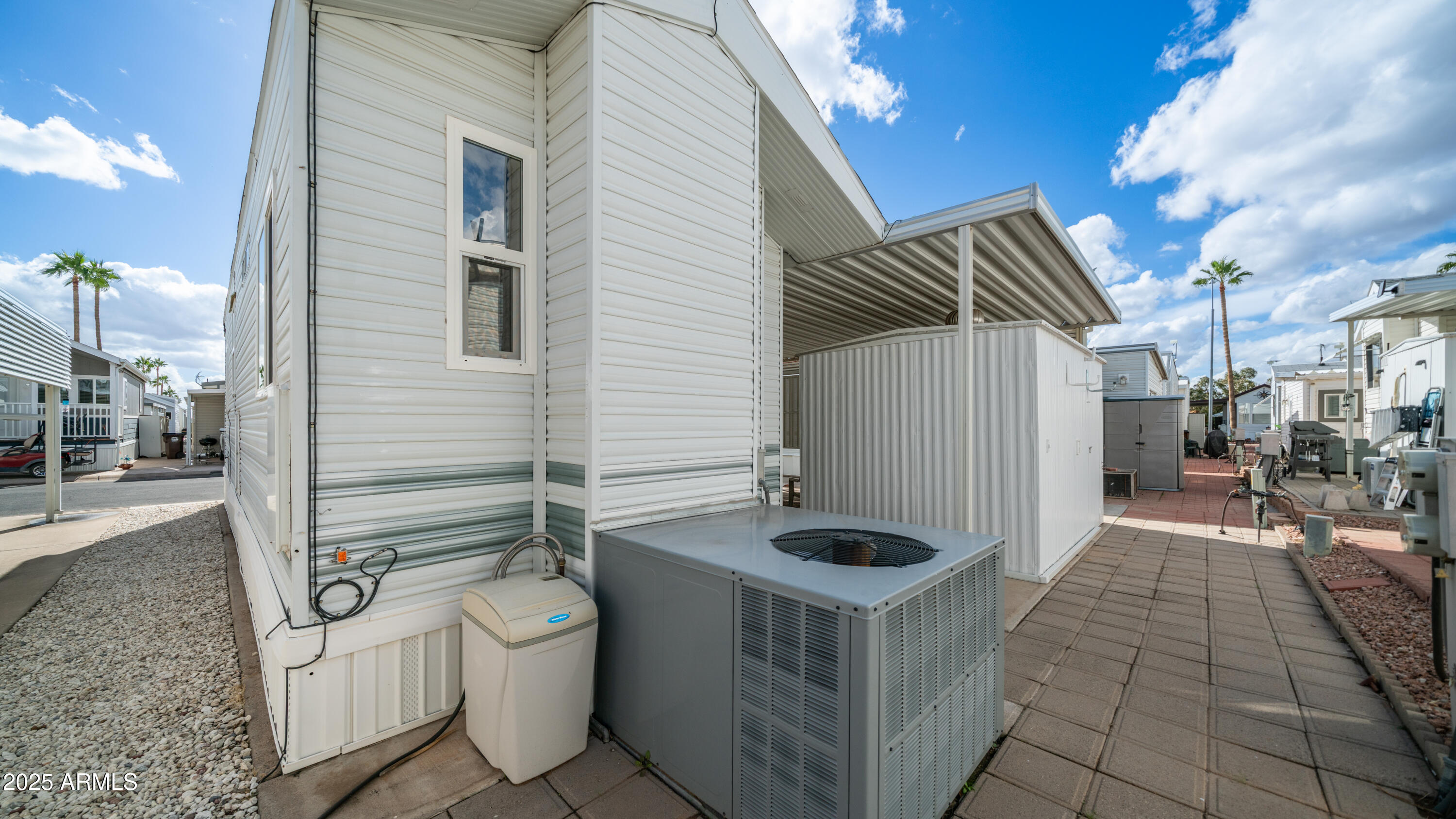 656 Gypsum Drive, Unit 656 Apache Junction, AZ 85119 - Photo 20 of 52 a bathroom with a sink a toilet and shower