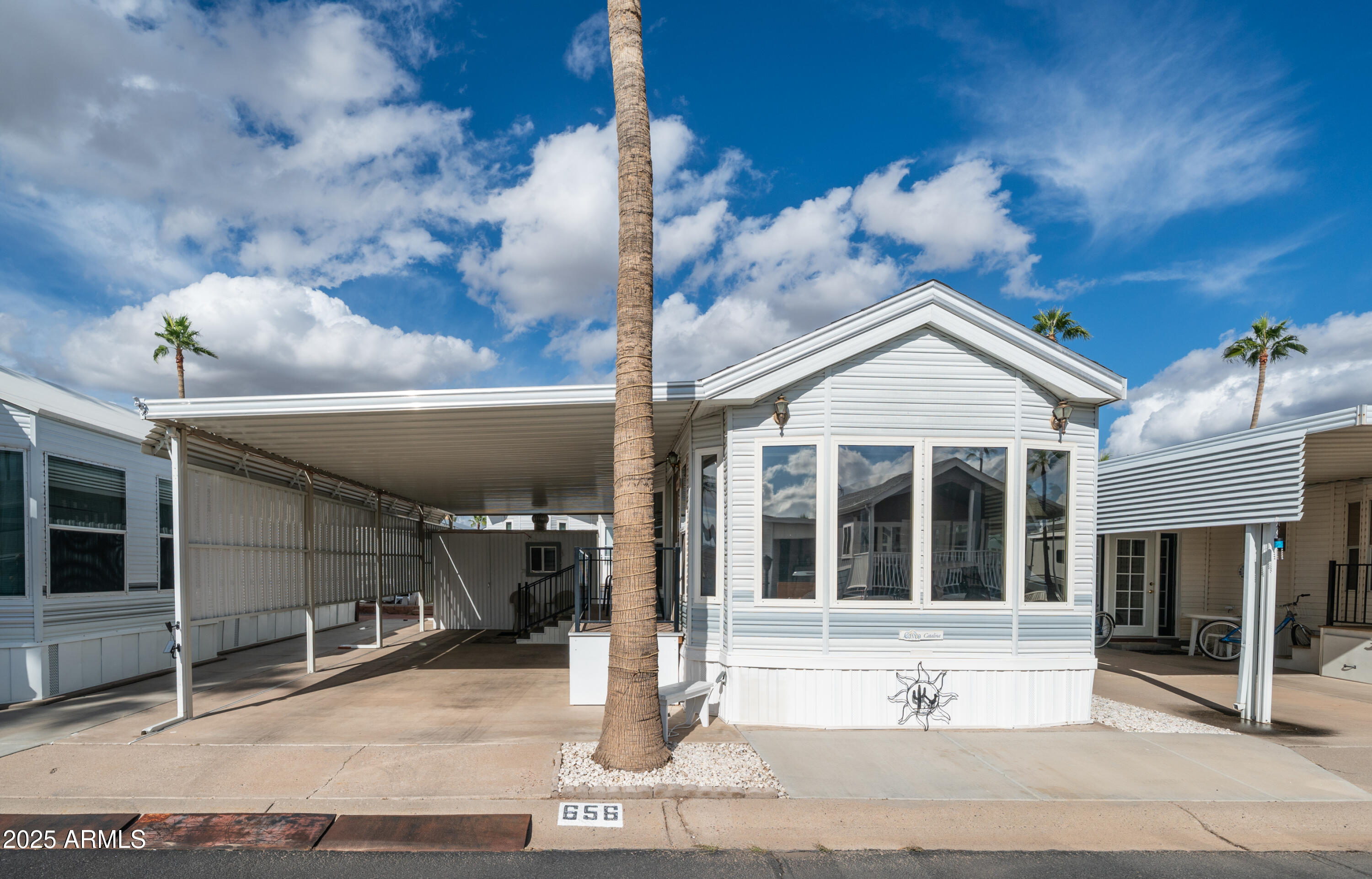 656 Gypsum Drive, Unit 656 Apache Junction, AZ 85119 - Photo 3 of 52 a view of entrance gate of the house