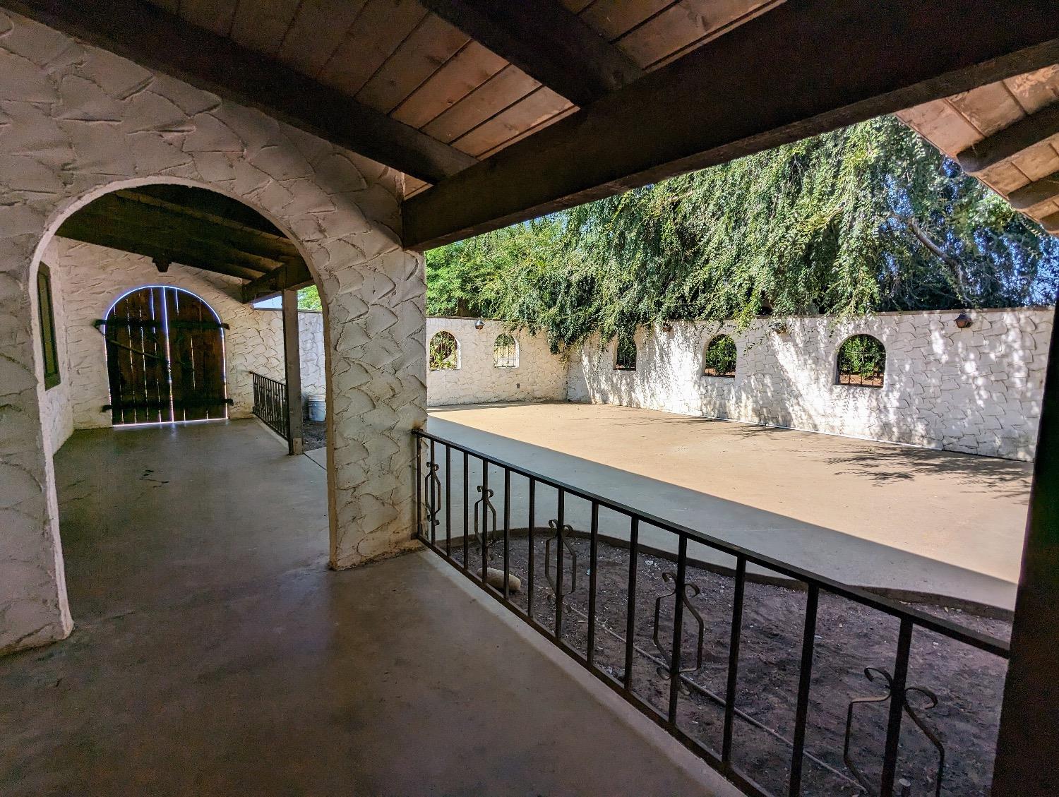 14066 Ave 392 Cutler, CA 93615 - Photo 5 of 18 a view of a porch with furniture and garden