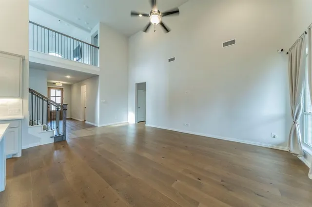 a view of an entryway with wooden floor