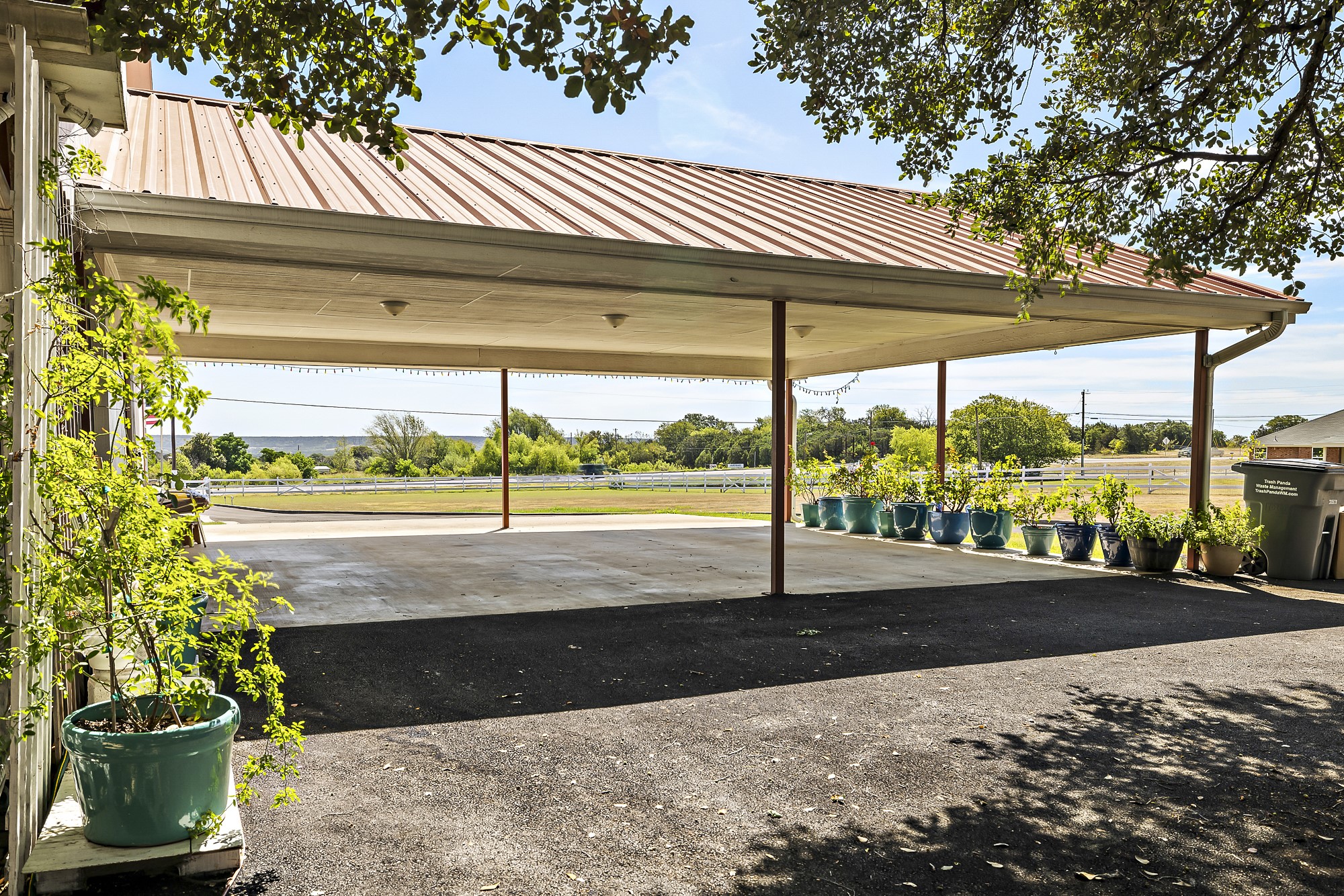 3656 Farm To Market Road 2657 Kempner, TX 76539 - Photo 17 of 39 a view of a patio with a table and chairs and potted plants