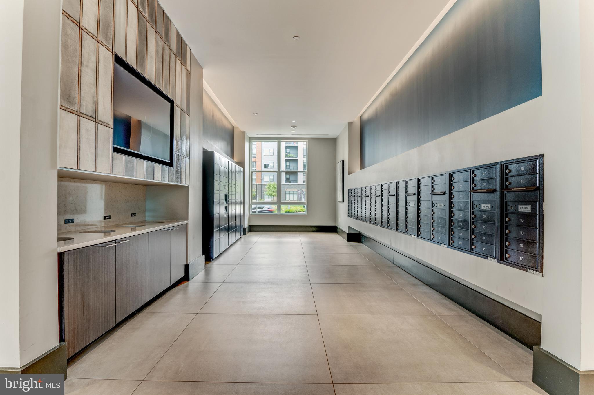 1761 Old Meadow Road, Unit 209 McLean, VA 22102 - Photo 23 of 58 a kitchen with stainless steel appliances granite countertop a stove and a sink