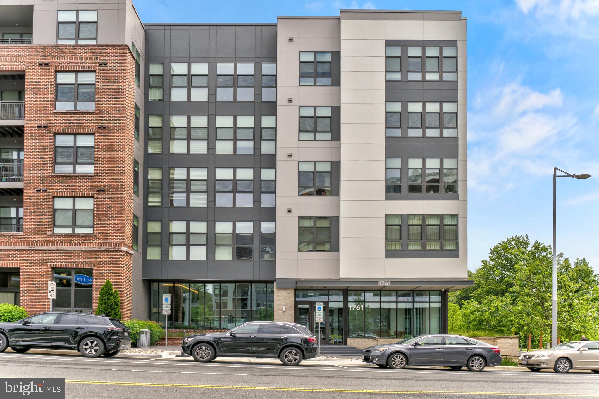 1761 Old Meadow Road, Unit 209 McLean, VA 22102 - Photo 35 of 58 a car parked in front of a building