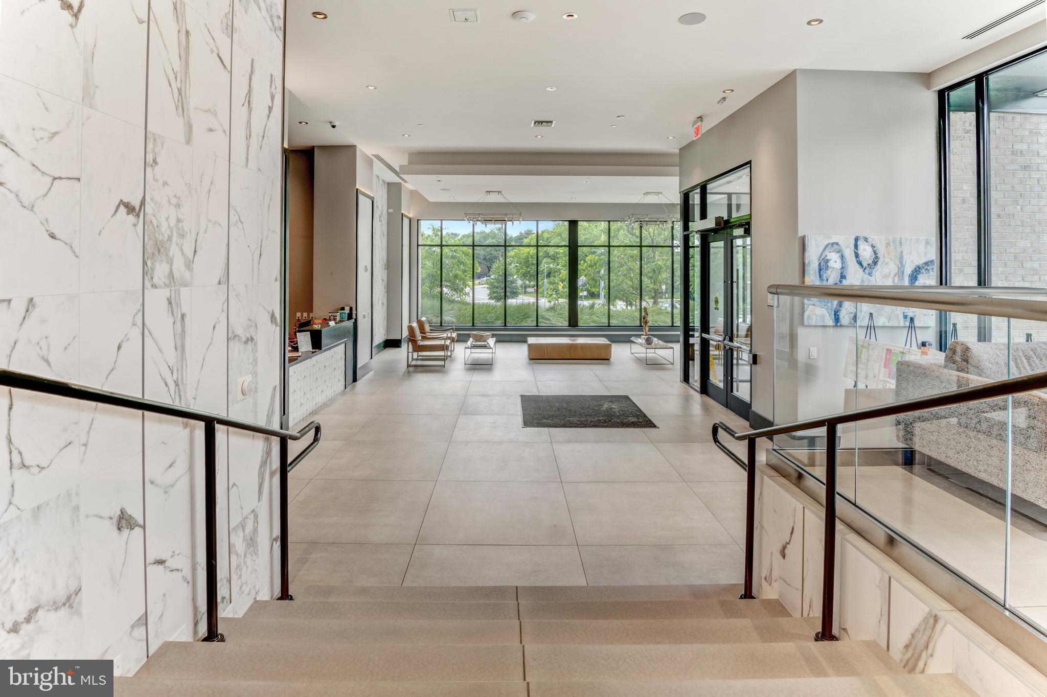 1761 Old Meadow Road, Unit 209 McLean, VA 22102 - Photo 43 of 58 a reading room with furniture and large window
