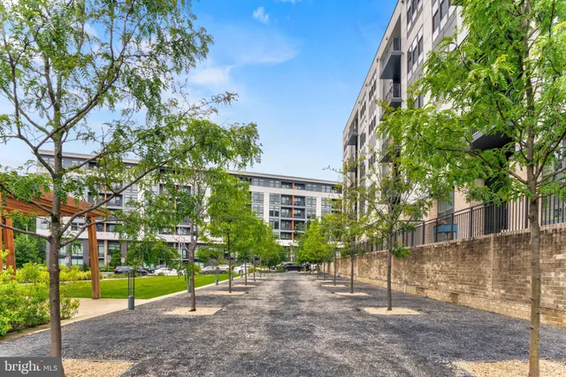 a view of a building with a yard