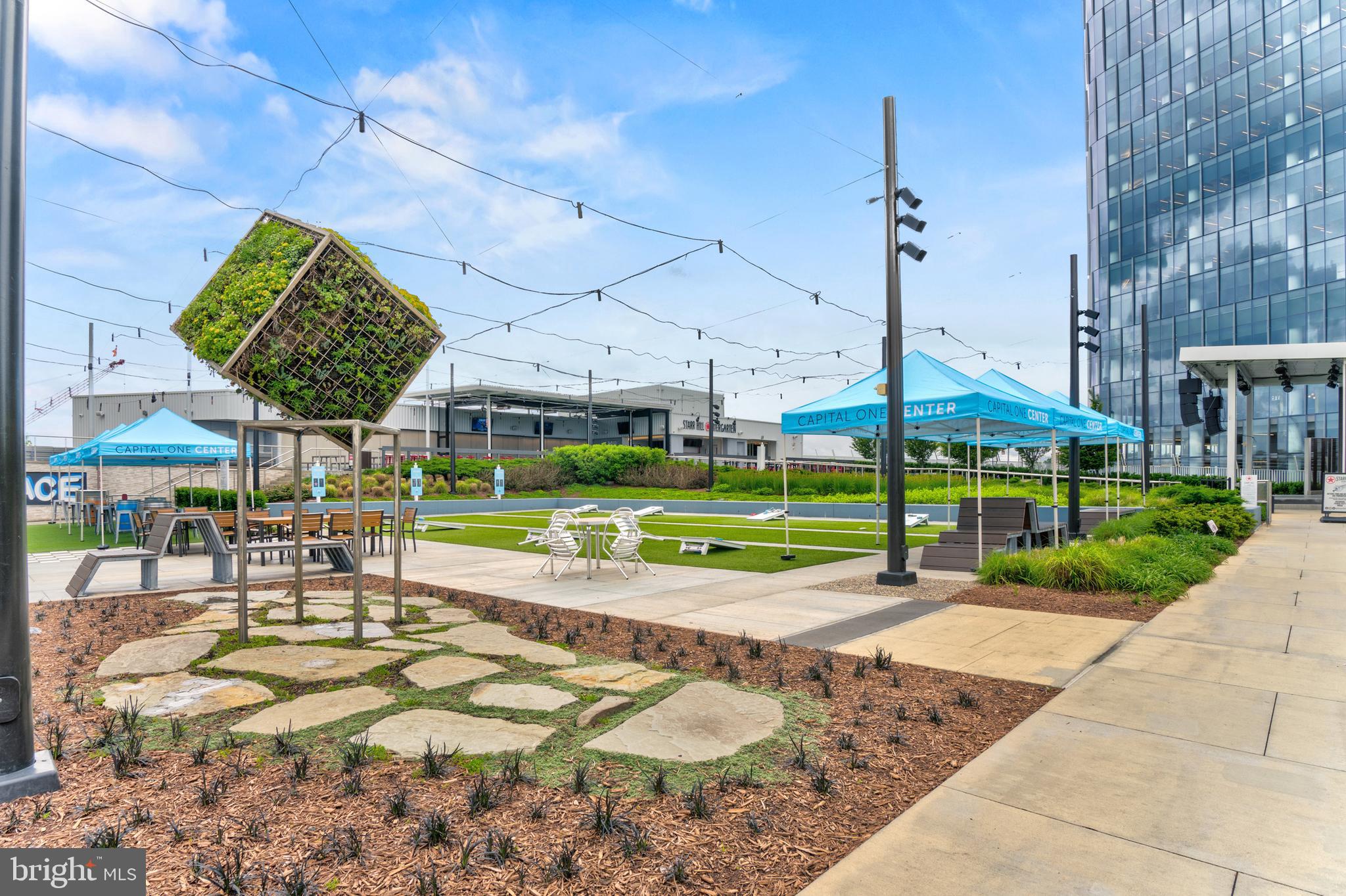 1761 Old Meadow Road, Unit 209 McLean, VA 22102 - Photo 53 of 58 a view of a swimming pool with a patio