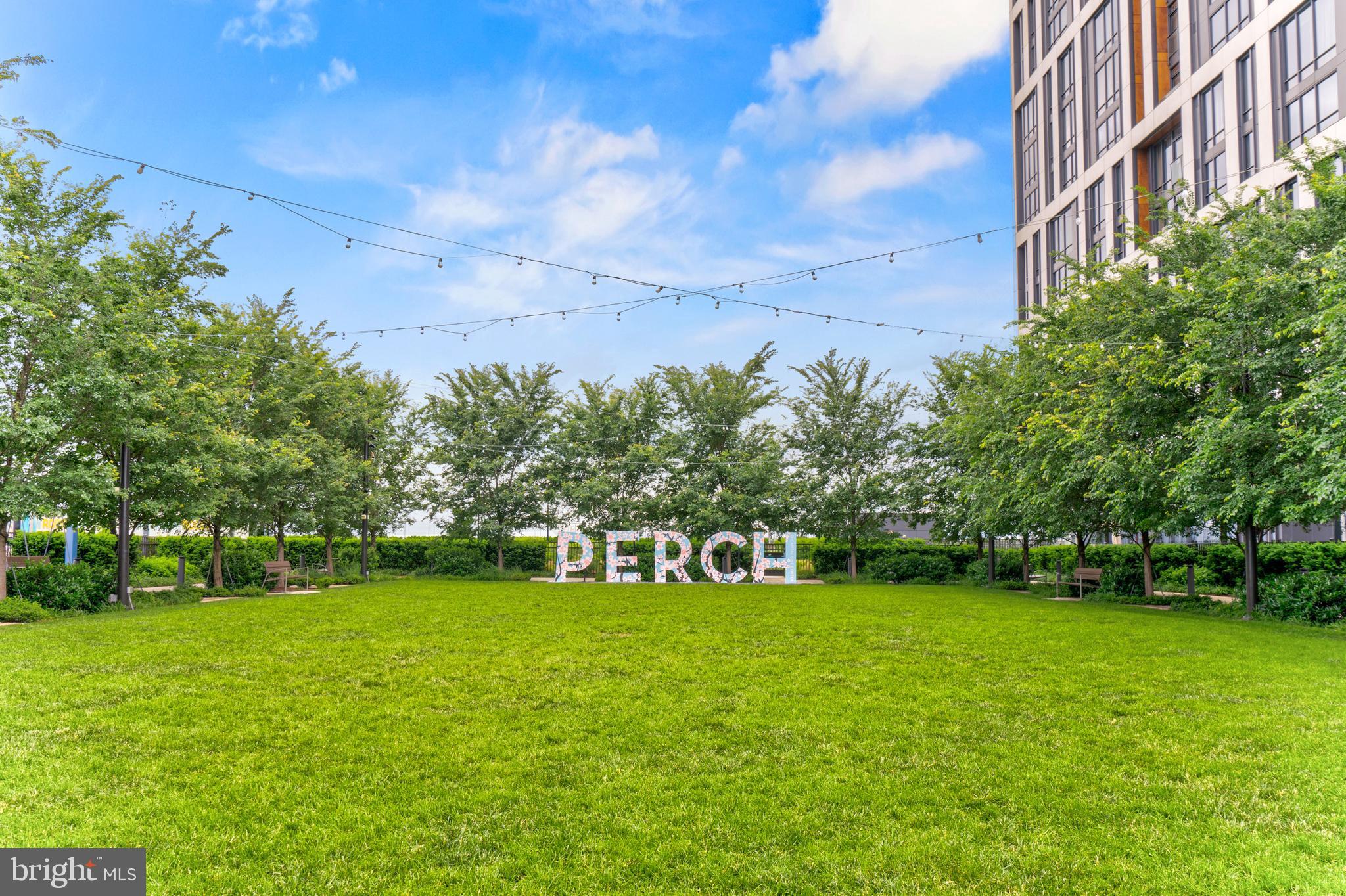 1761 Old Meadow Road, Unit 209 McLean, VA 22102 - Photo 54 of 58 a view of a field of grass and trees