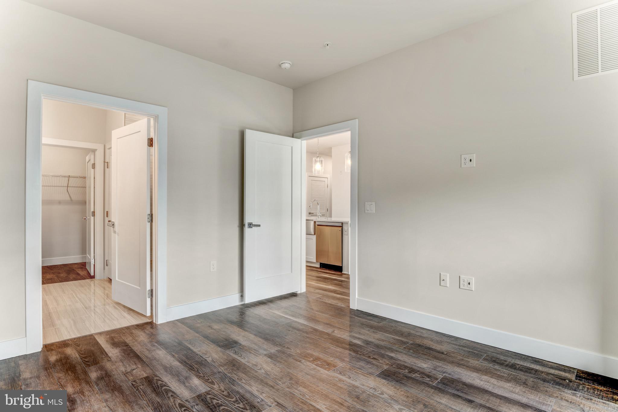 1761 Old Meadow Road, Unit 209 McLean, VA 22102 - Photo 10 of 58 a view of an empty room