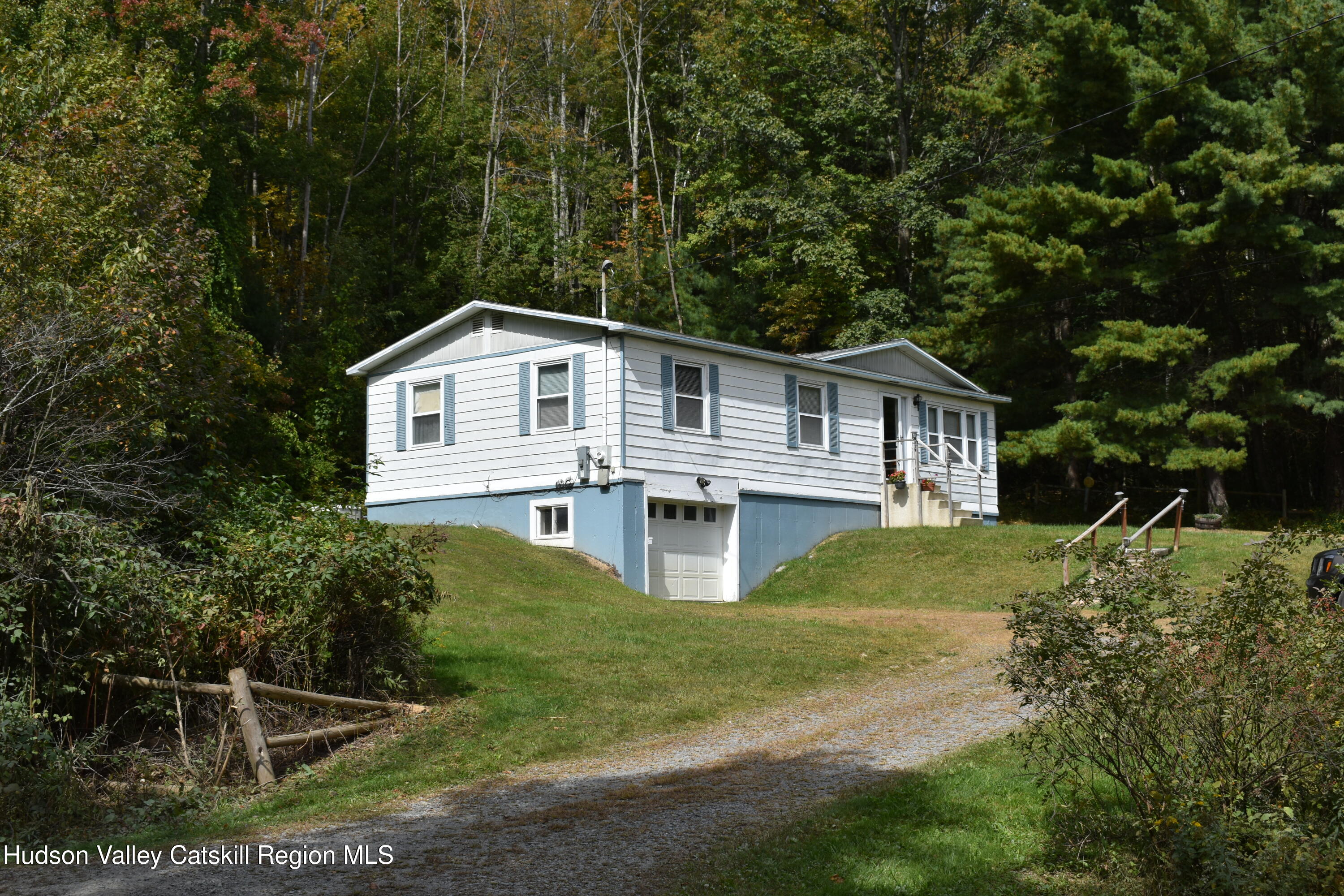 205 Middle Road Austerlitz, NY 12017 - Photo 2 of 15 a front view of a house with yard and green space