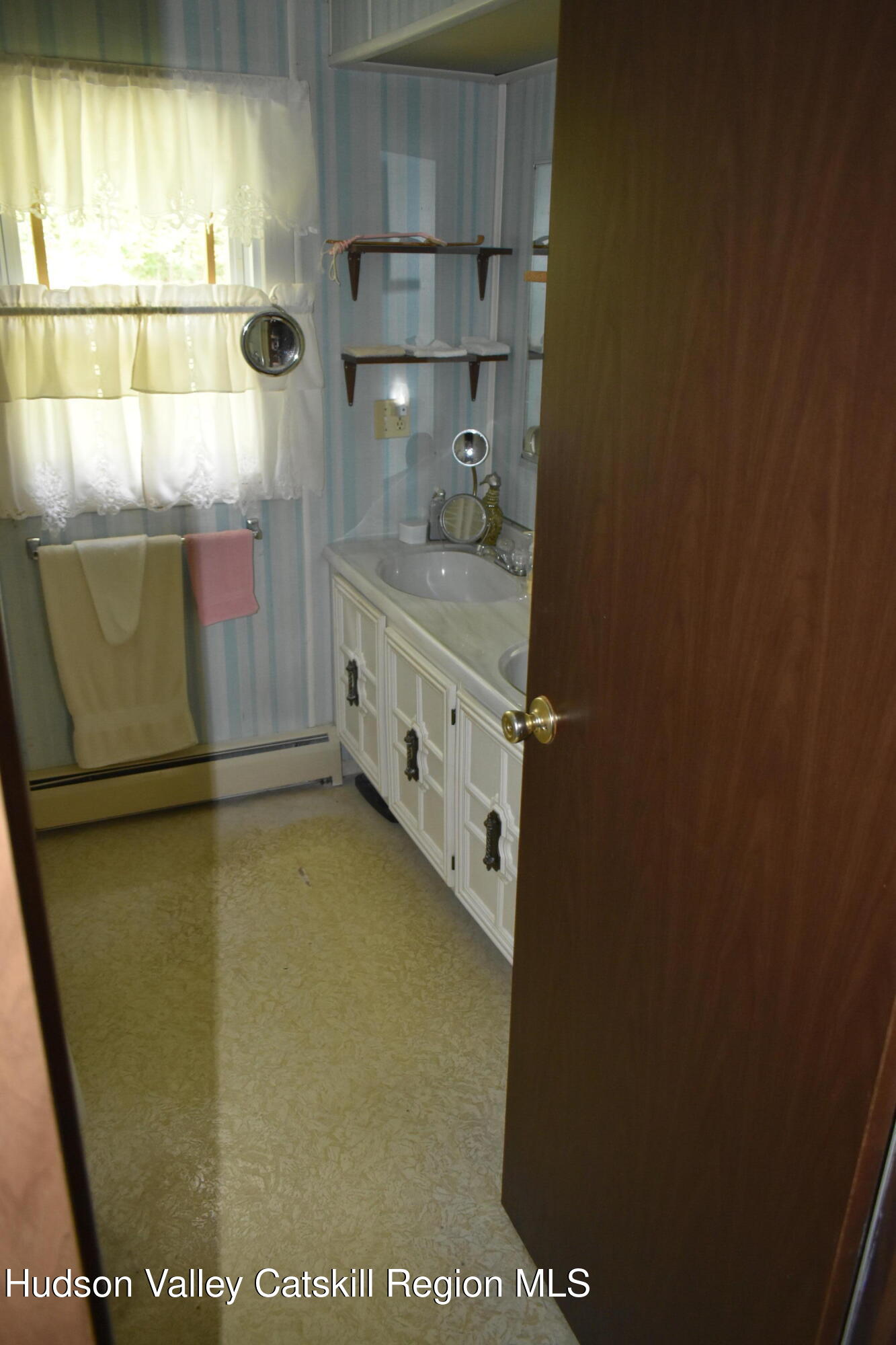205 Middle Road Austerlitz, NY 12017 - Photo 8 of 15 a bathroom with a shower and a sink