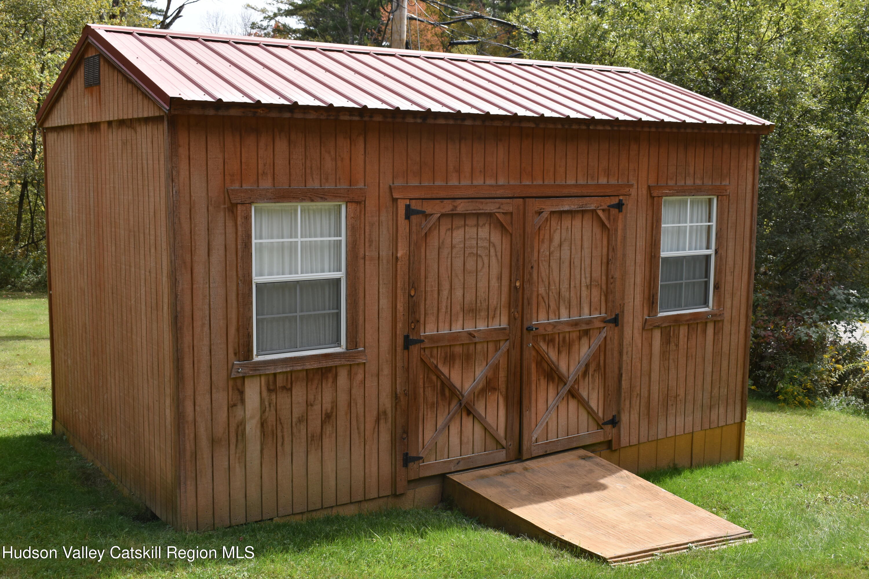 205 Middle Road Austerlitz, NY 12017 - Photo 10 of 15 a front view of a house with garden