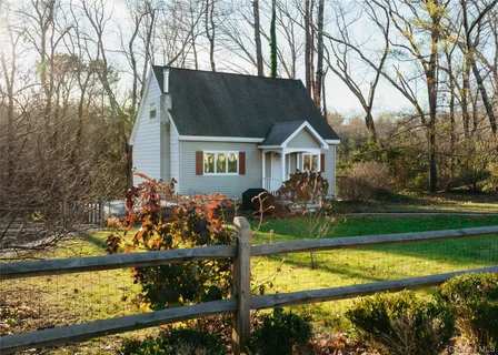 front view of house with a yard