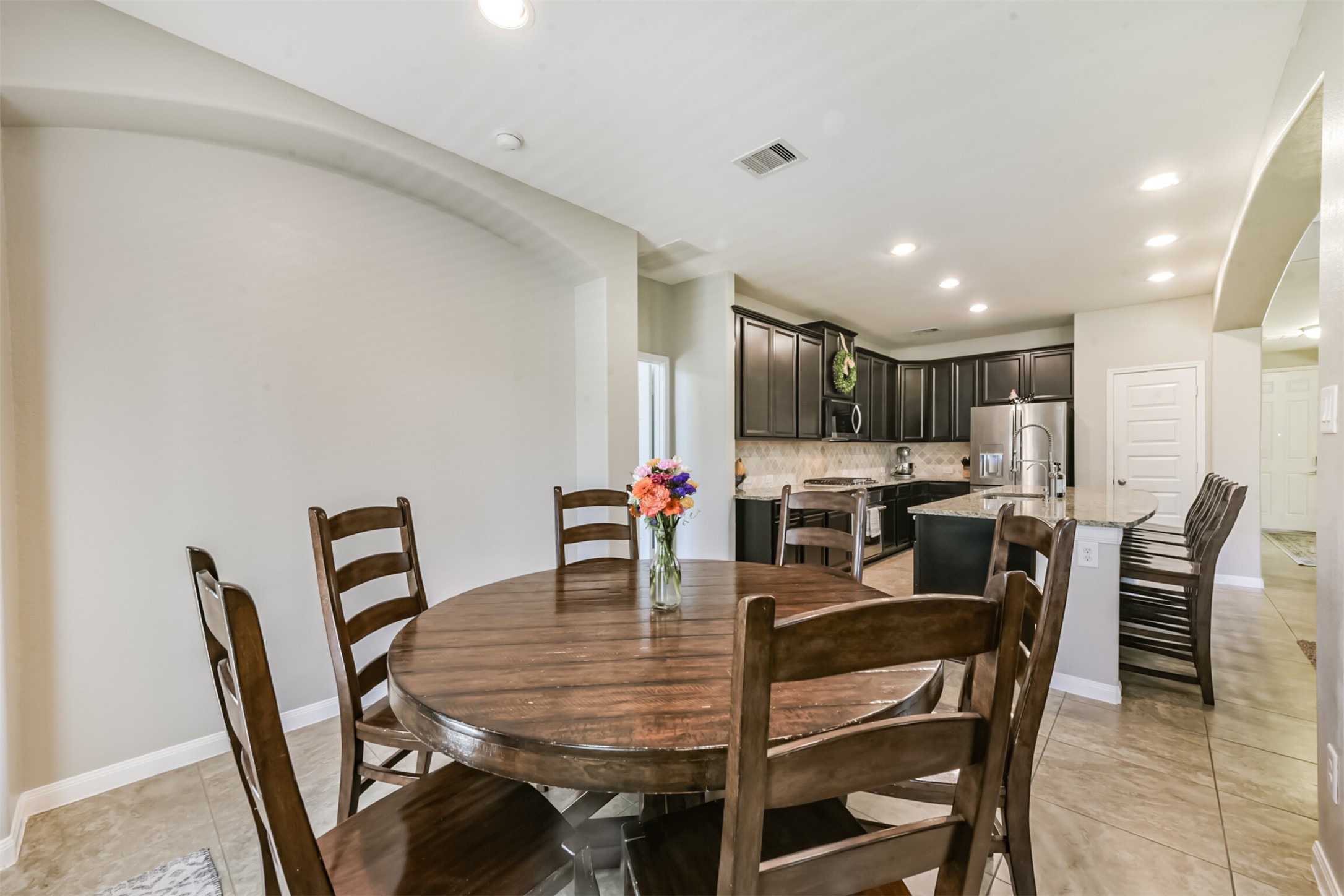 17120 Edge Branch Lane Houston, TX 77044 - Photo 17 of 50 a view of a dining room with furniture