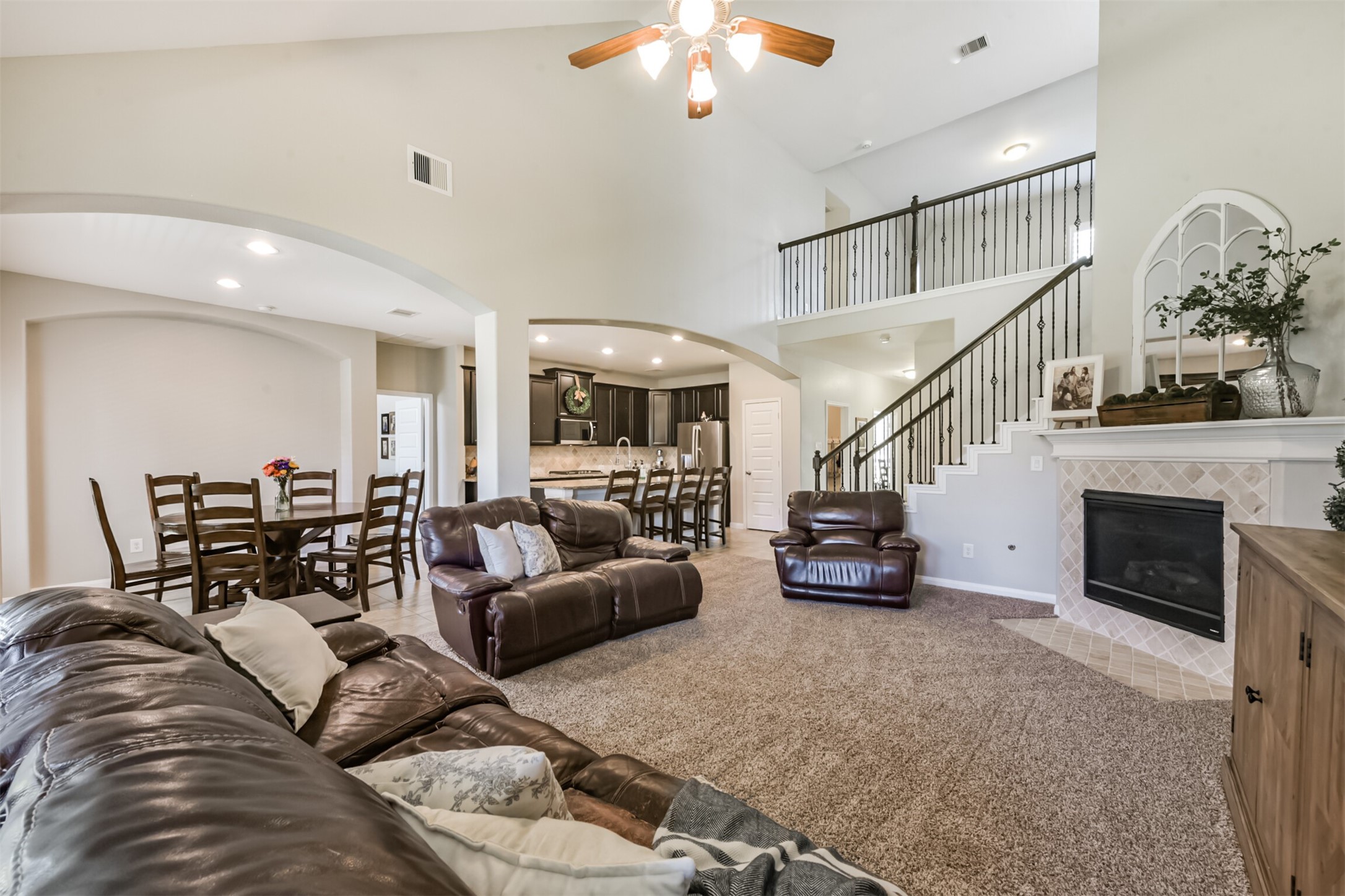 17120 Edge Branch Lane Houston, TX 77044 - Photo 21 of 50 a living room with furniture and a fireplace