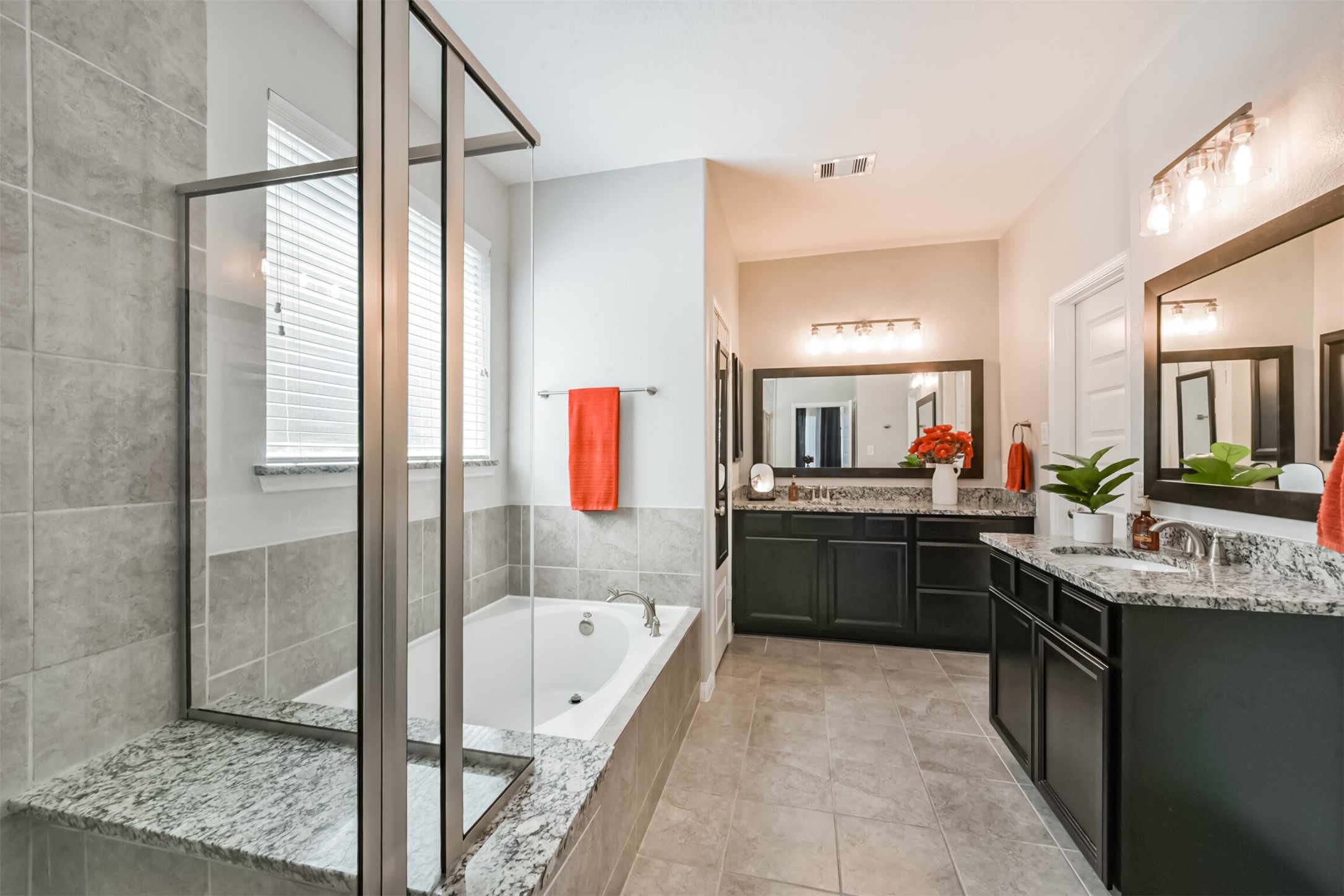 17120 Edge Branch Lane Houston, TX 77044 - Photo 27 of 50 a large white kitchen with a large window