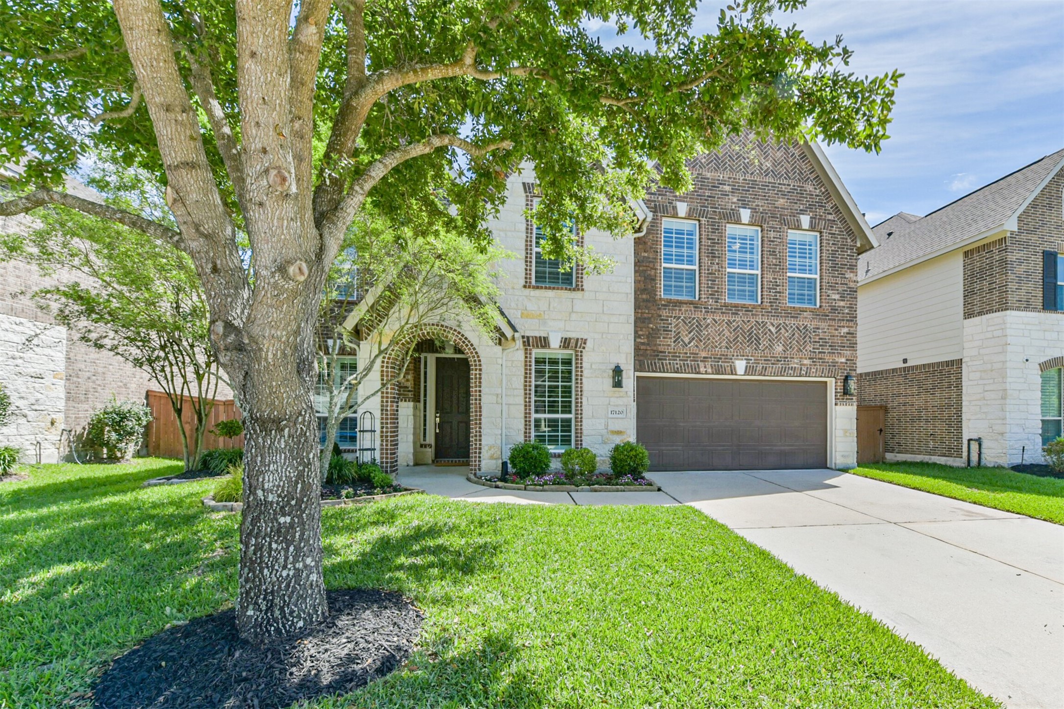 17120 Edge Branch Lane Houston, TX 77044 - Photo 4 of 50 a front view of a house with garden