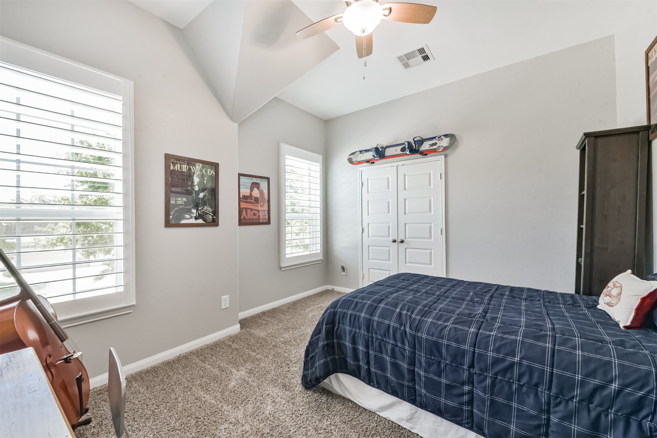 17120 Edge Branch Lane Houston, TX 77044 - Photo 41 of 50 a bedroom with a bed and a window