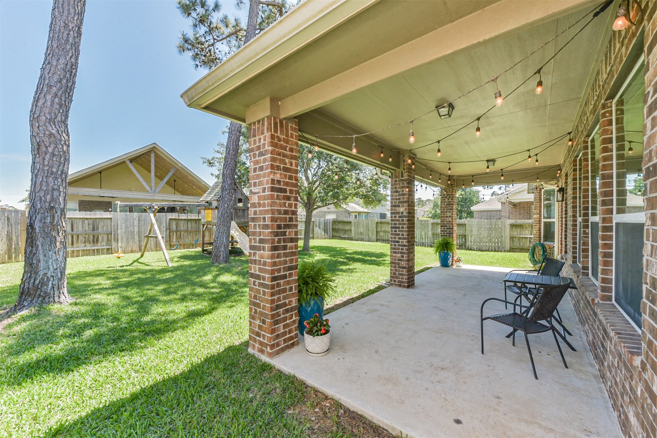 17120 Edge Branch Lane Houston, TX 77044 - Photo 45 of 50 a view of a porch with furniture and garden