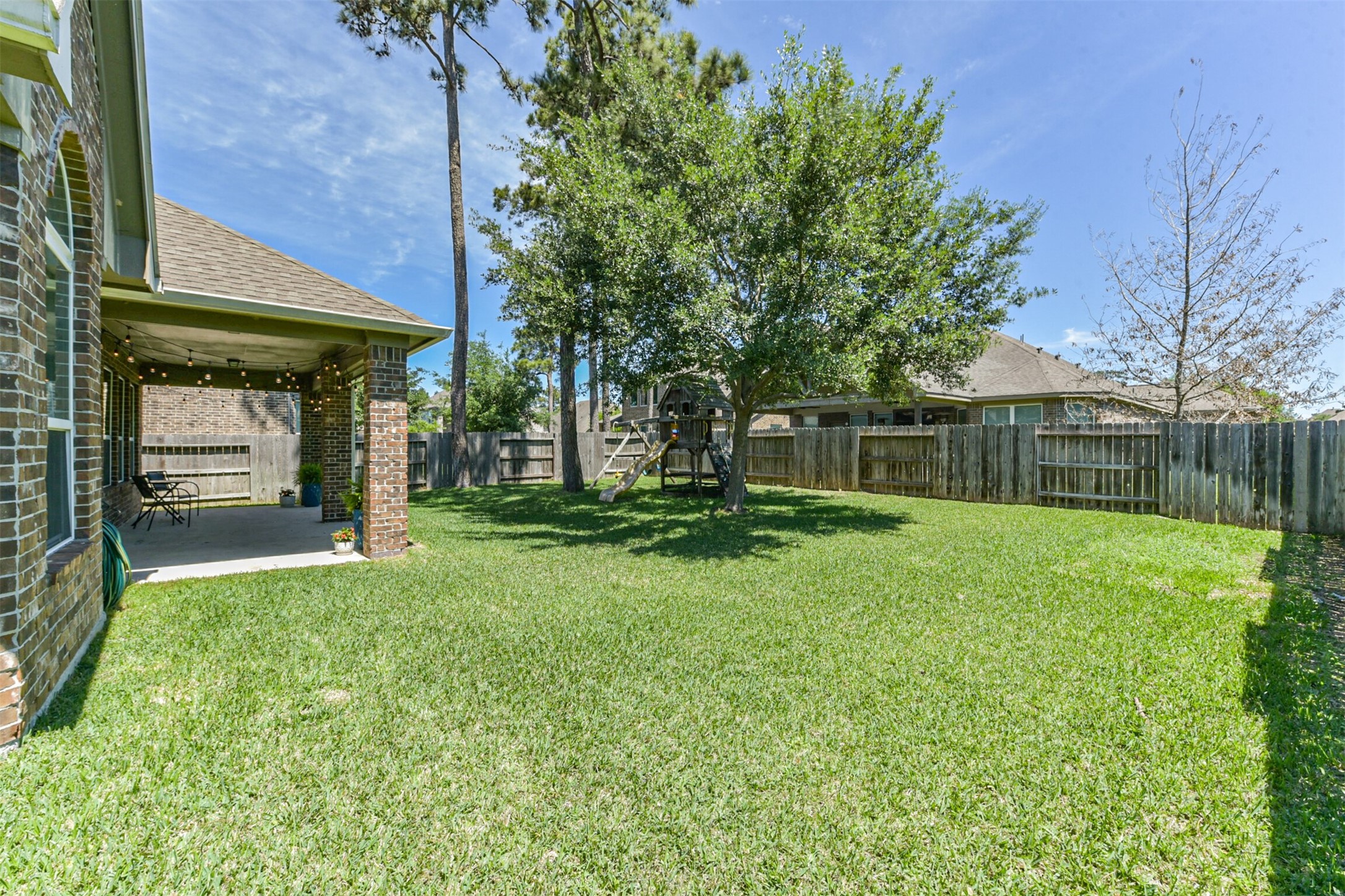 17120 Edge Branch Lane Houston, TX 77044 - Photo 46 of 50 a view of a back yard of the house