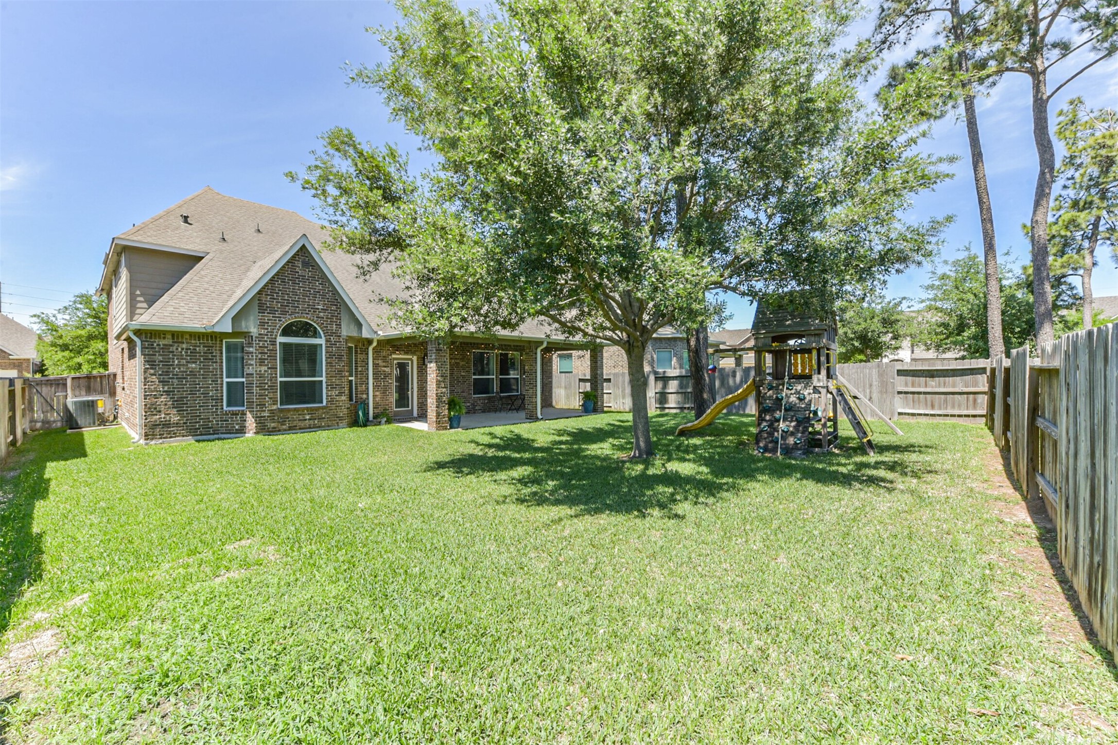 17120 Edge Branch Lane Houston, TX 77044 - Photo 47 of 50 a front view of a house with a yard