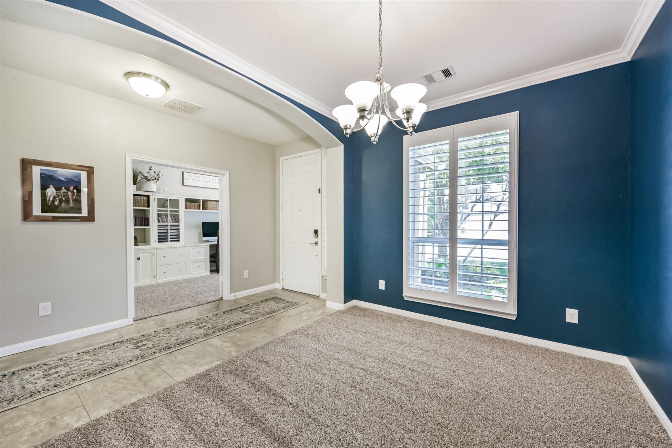 17120 Edge Branch Lane Houston, TX 77044 - Photo 7 of 50 a view of an empty room with a window