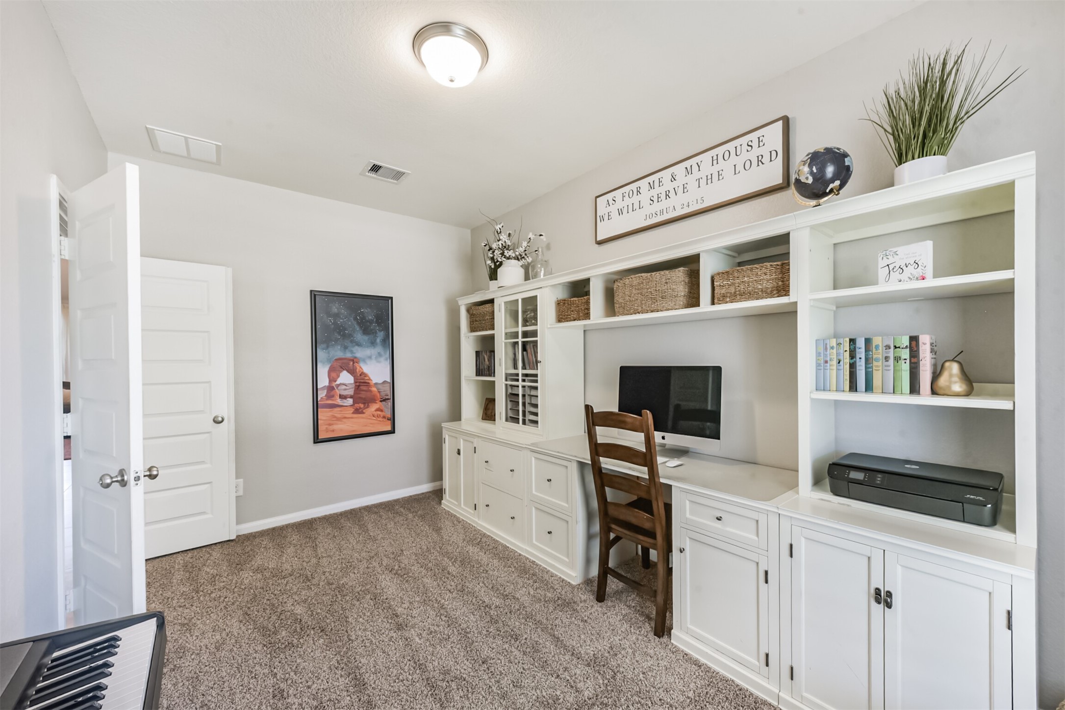 17120 Edge Branch Lane Houston, TX 77044 - Photo 10 of 50 a view of a livingroom with workspace and a window