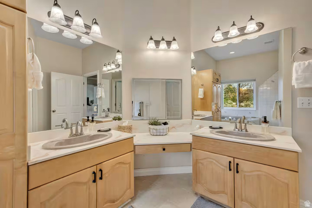 11789 Nicklaus Road Sandy, UT 84092 - Photo 38 of 58 Bathroom featuring double vanity