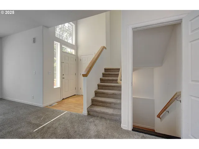 a view of entryway with stairs