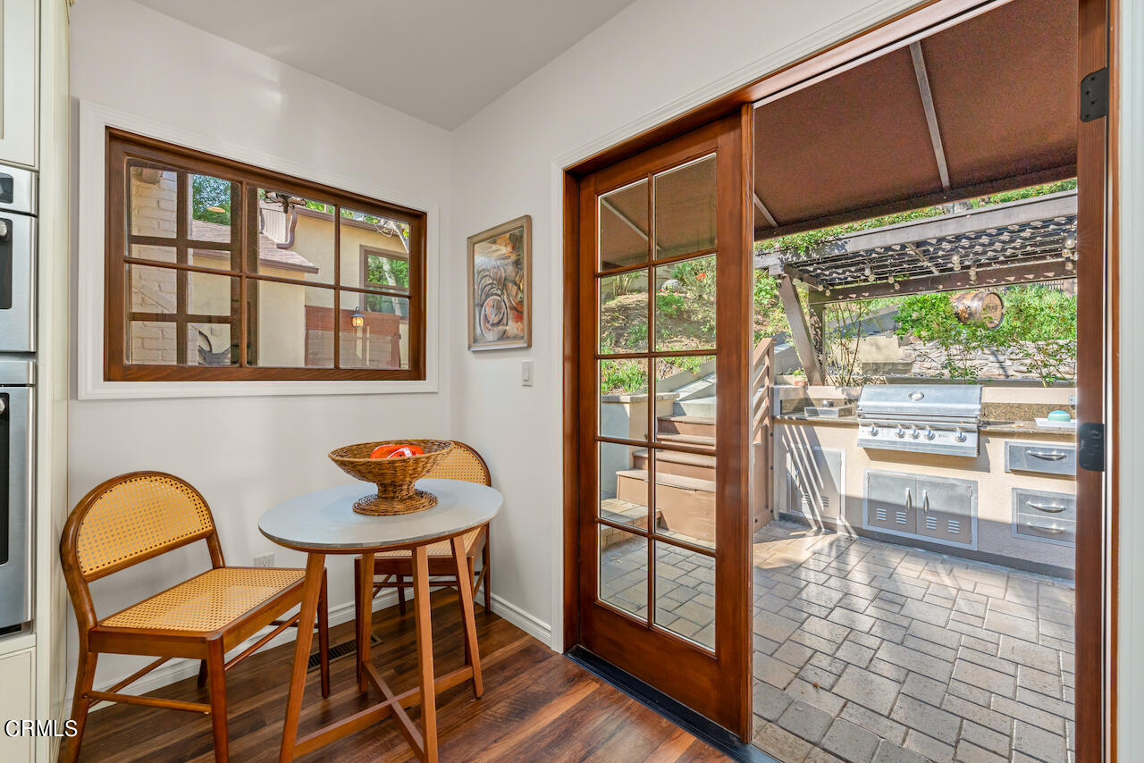1425 Hillside Drive Glendale, CA 91208 - Photo 20 of 68 a dining room with a table and chairs