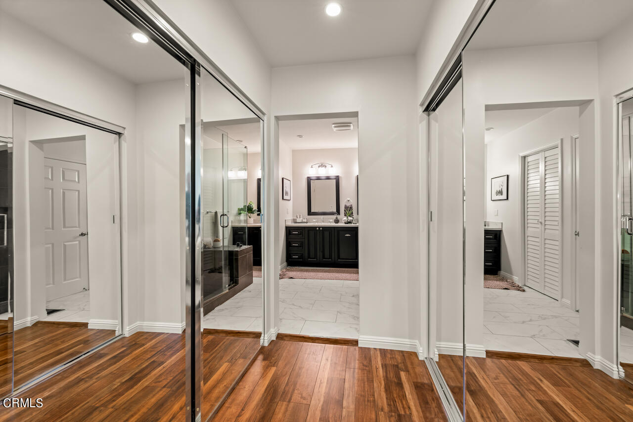 1425 Hillside Drive Glendale, CA 91208 - Photo 25 of 68 a view of a hallway with wooden floor and staircase