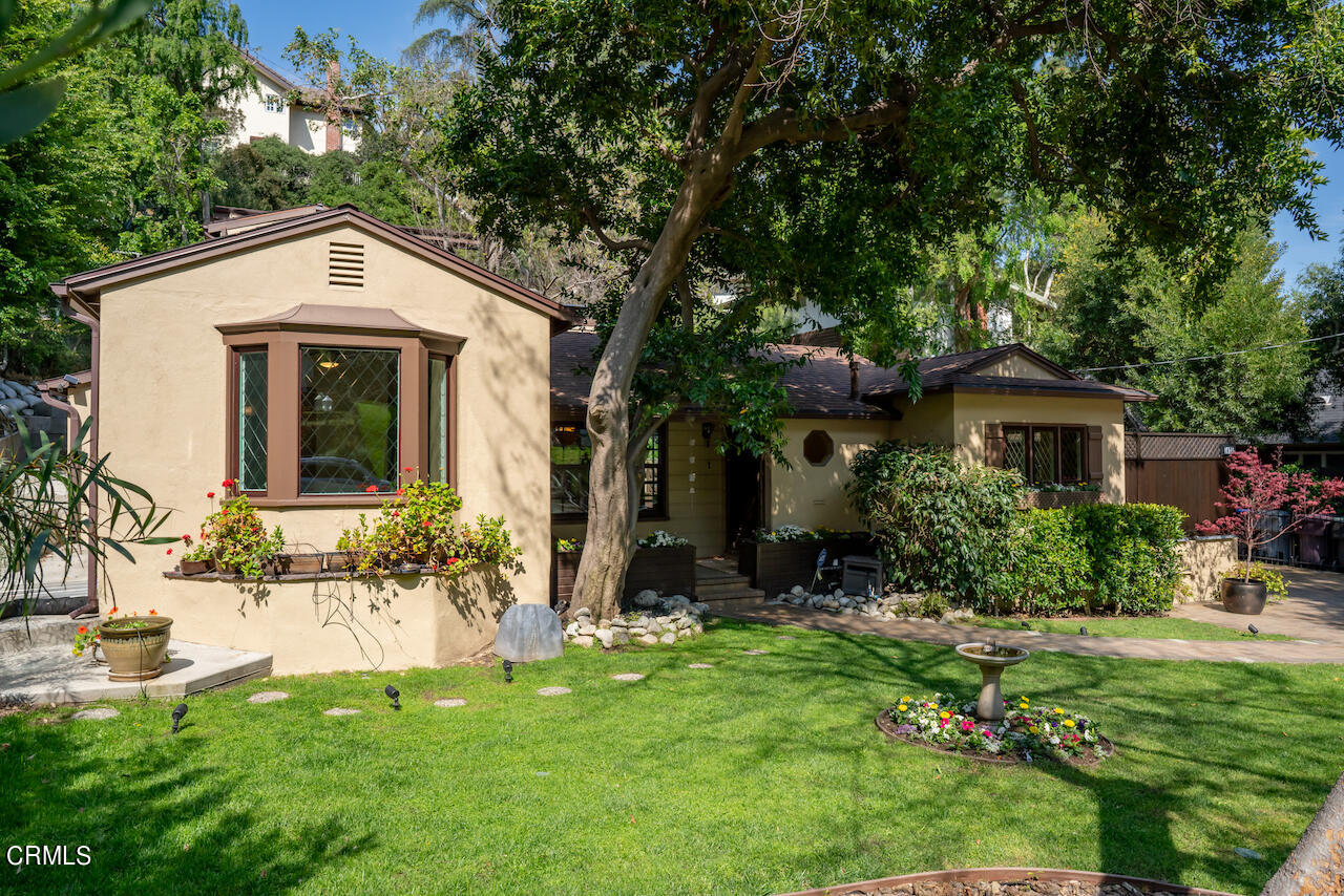1425 Hillside Drive Glendale, CA 91208 - Photo 5 of 68 a front view of a house with a yard
