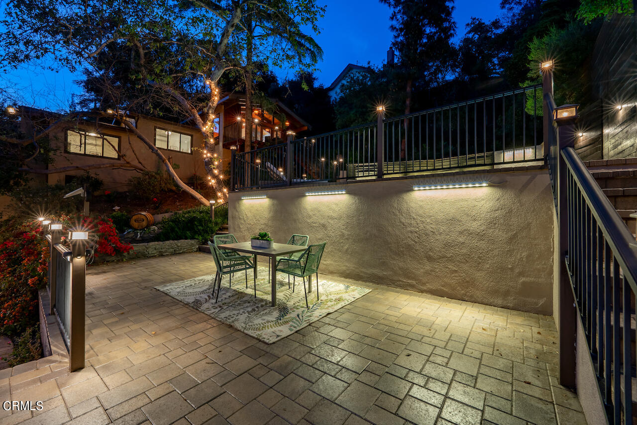 1425 Hillside Drive Glendale, CA 91208 - Photo 54 of 68 a view of a patio with table and chairs and potted plants