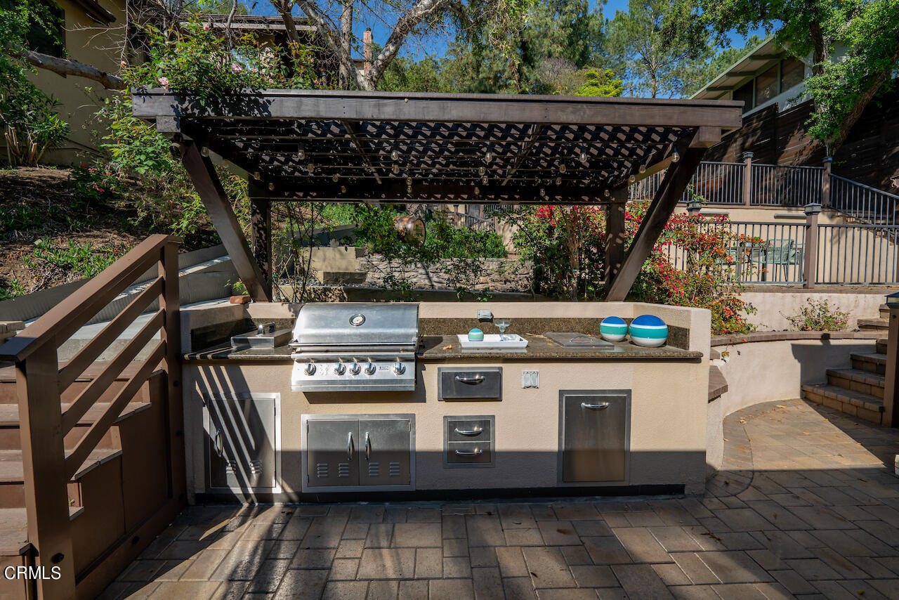 1425 Hillside Drive Glendale, CA 91208 - Photo 58 of 68 a view of a kitchen with a stove and a microwave