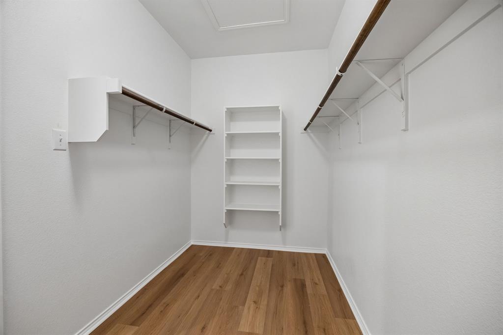 1006 Voca Dr. Forney, TX 75126 - Photo 18 of 26 a view of an empty walk in closet