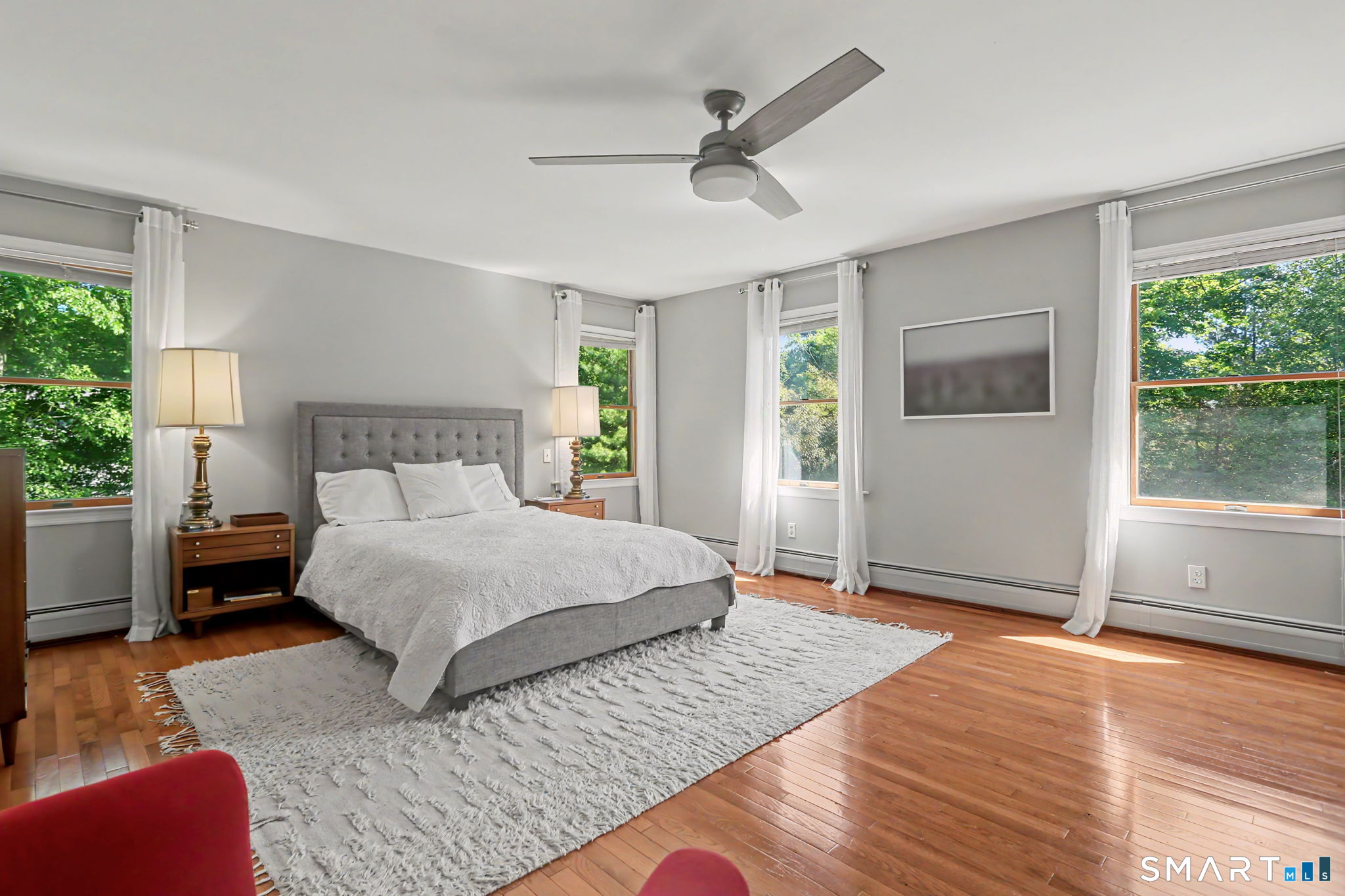 2 Rising Road Norwalk, CT 06850 - Photo 17 of 33 a bedroom with a large bed and a window