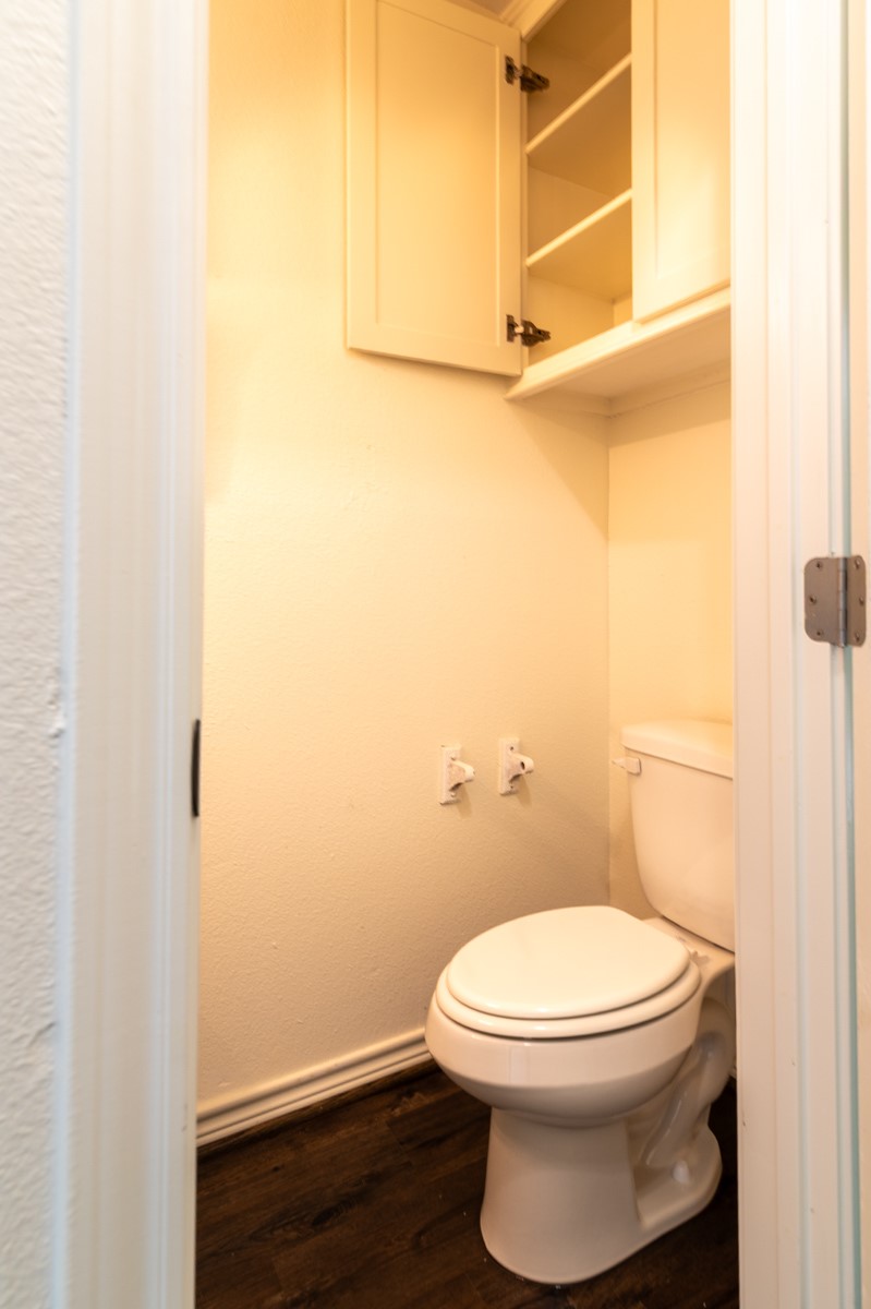 13087 Crystal Trail Conroe, TX 77306 - Photo 29 of 47 a white toilet sitting next to a shower
