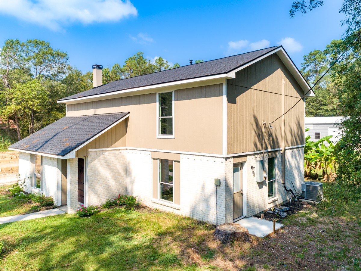 13087 Crystal Trail Conroe, TX 77306 - Photo 4 of 47 a view of a house with backyard