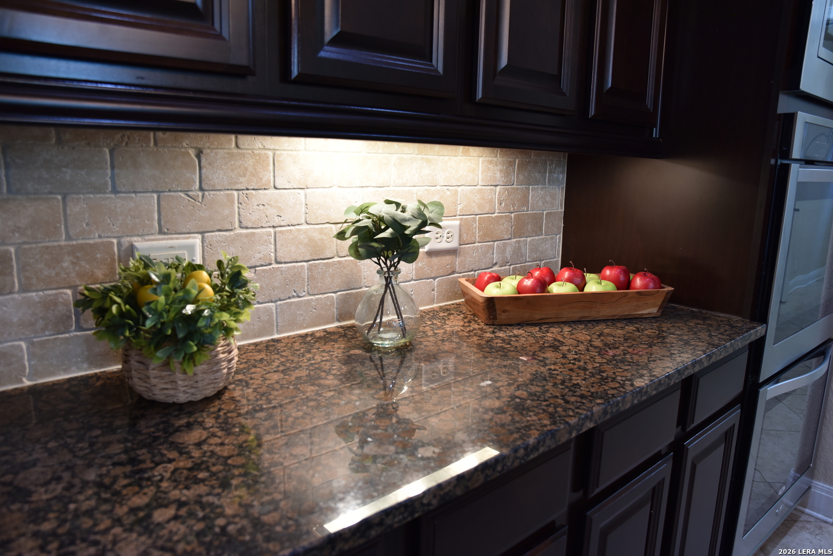 8907 Irving Hill Fair Oaks Ranch, TX 78015 - Photo 22 of 42 a vase of flowers sitting on a table