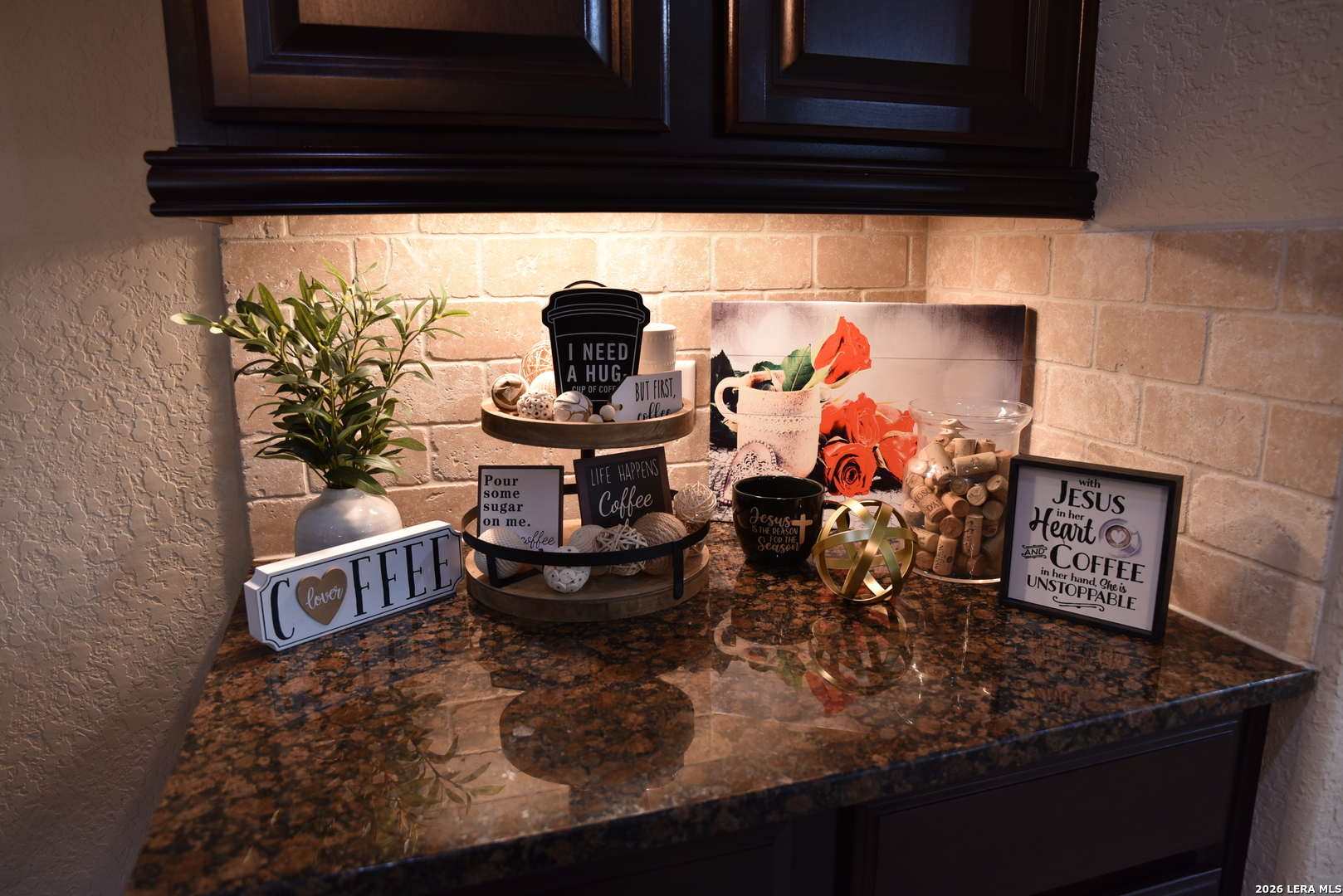 8907 Irving Hill Fair Oaks Ranch, TX 78015 - Photo 24 of 42 a kitchen with a stove and a cabinet