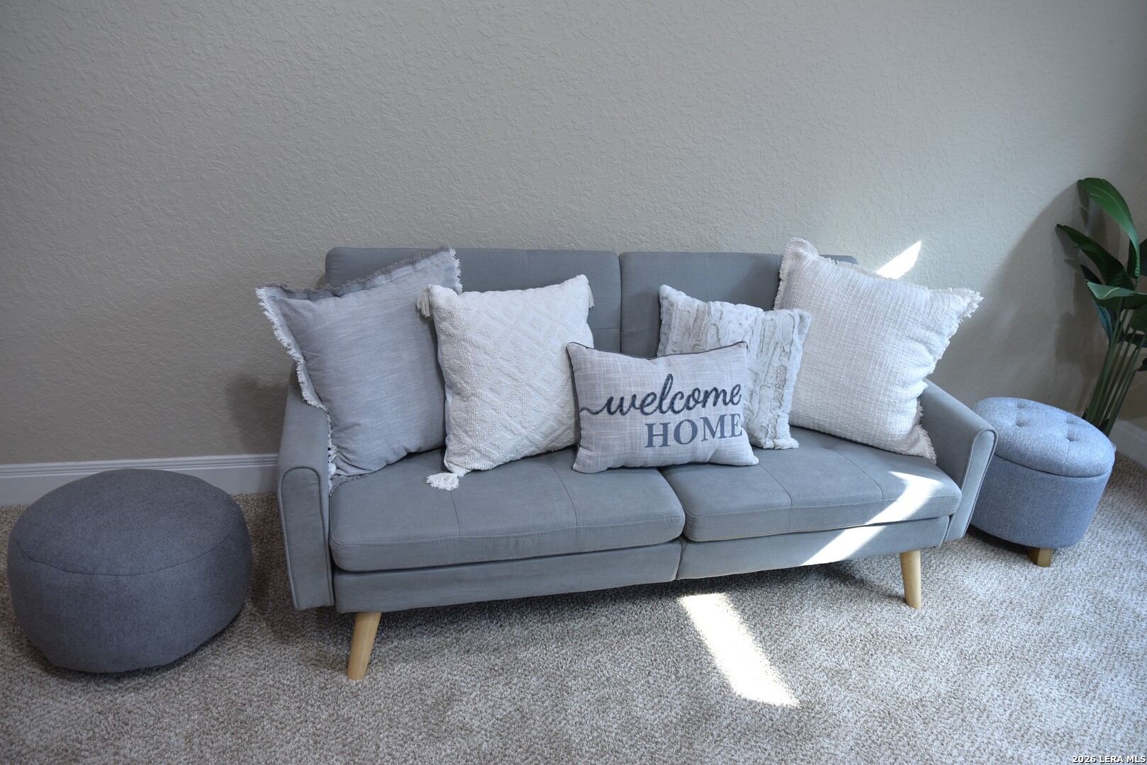 8907 Irving Hill Fair Oaks Ranch, TX 78015 - Photo 29 of 42 a living room with furniture and a couch