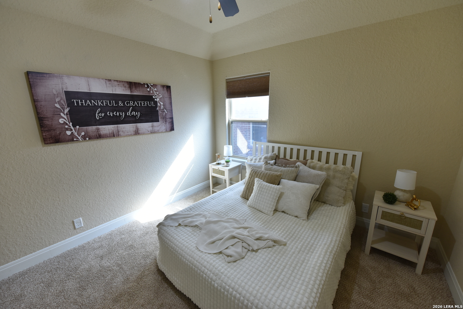 8907 Irving Hill Fair Oaks Ranch, TX 78015 - Photo 31 of 42 a bedroom with a bed and a couch