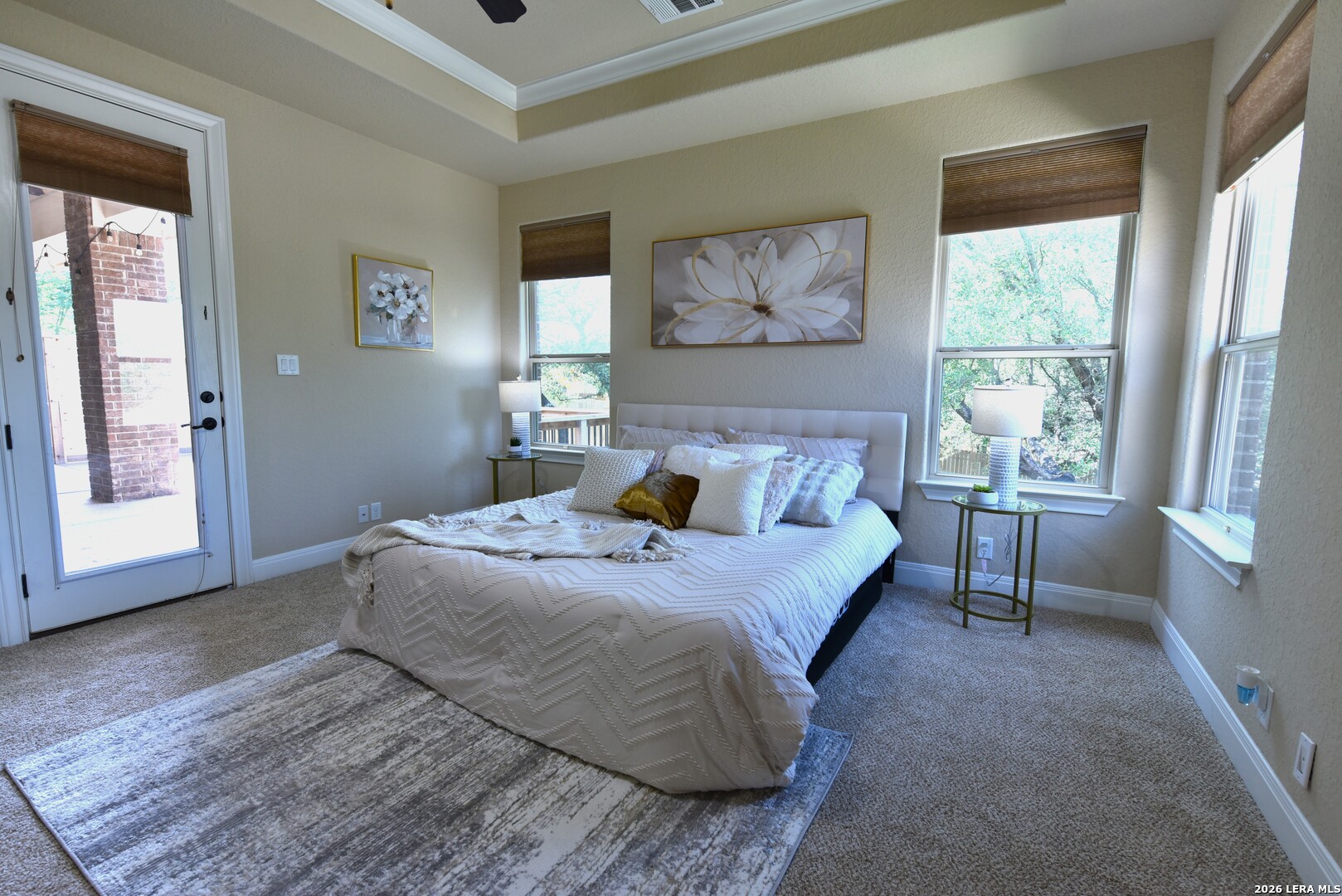 8907 Irving Hill Fair Oaks Ranch, TX 78015 - Photo 32 of 42 a bedroom with a bed and a window