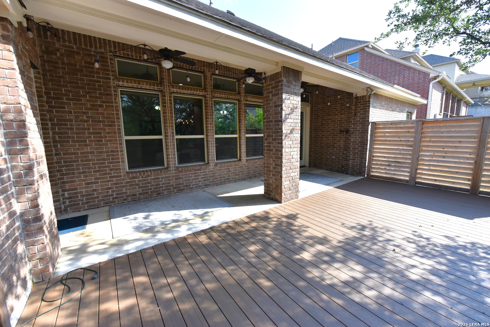 8907 Irving Hill Fair Oaks Ranch, TX 78015 - Photo 38 of 42 a view of a house with a yard