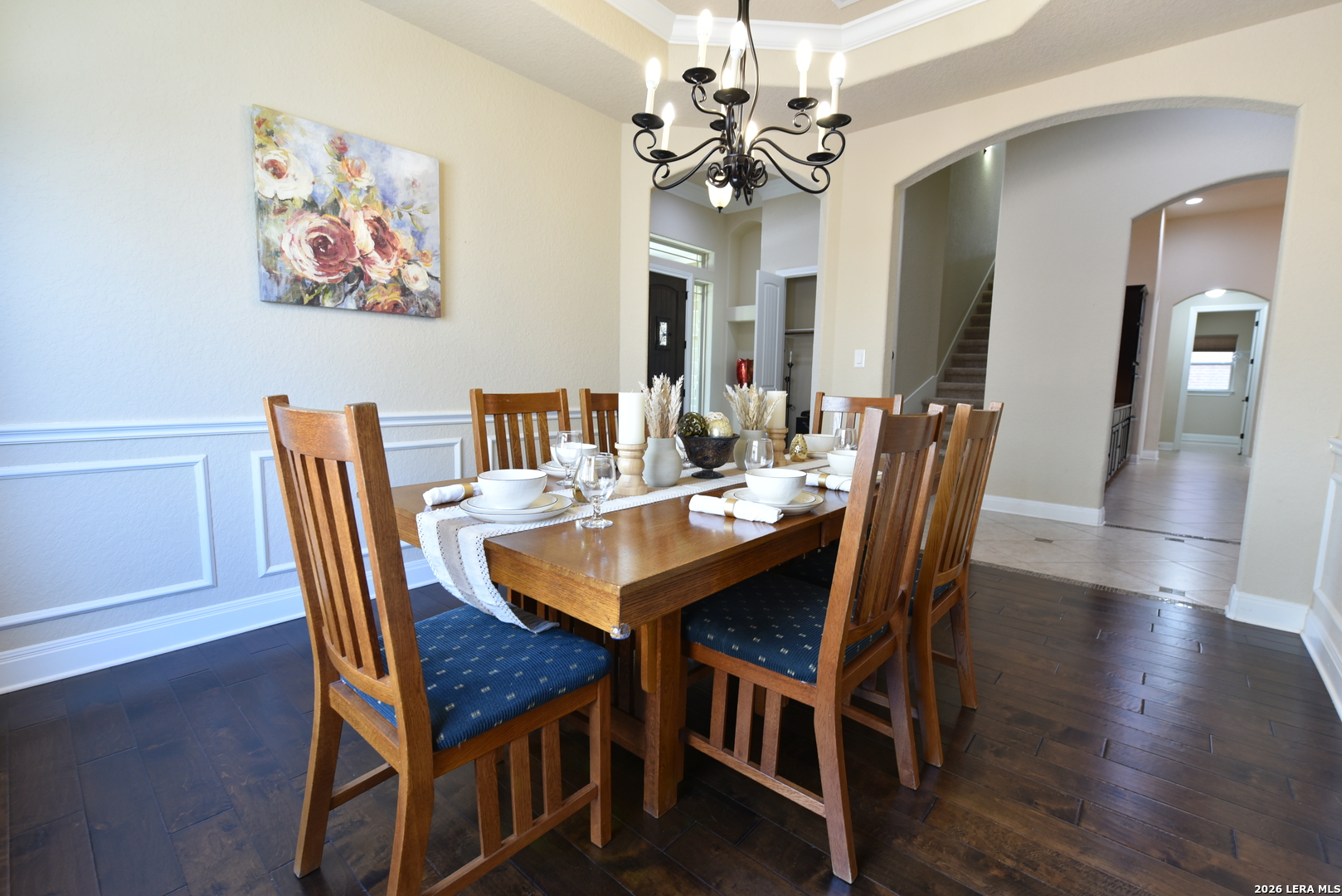 8907 Irving Hill Fair Oaks Ranch, TX 78015 - Photo 5 of 42 a dining room with furniture a chandelier and wooden floor