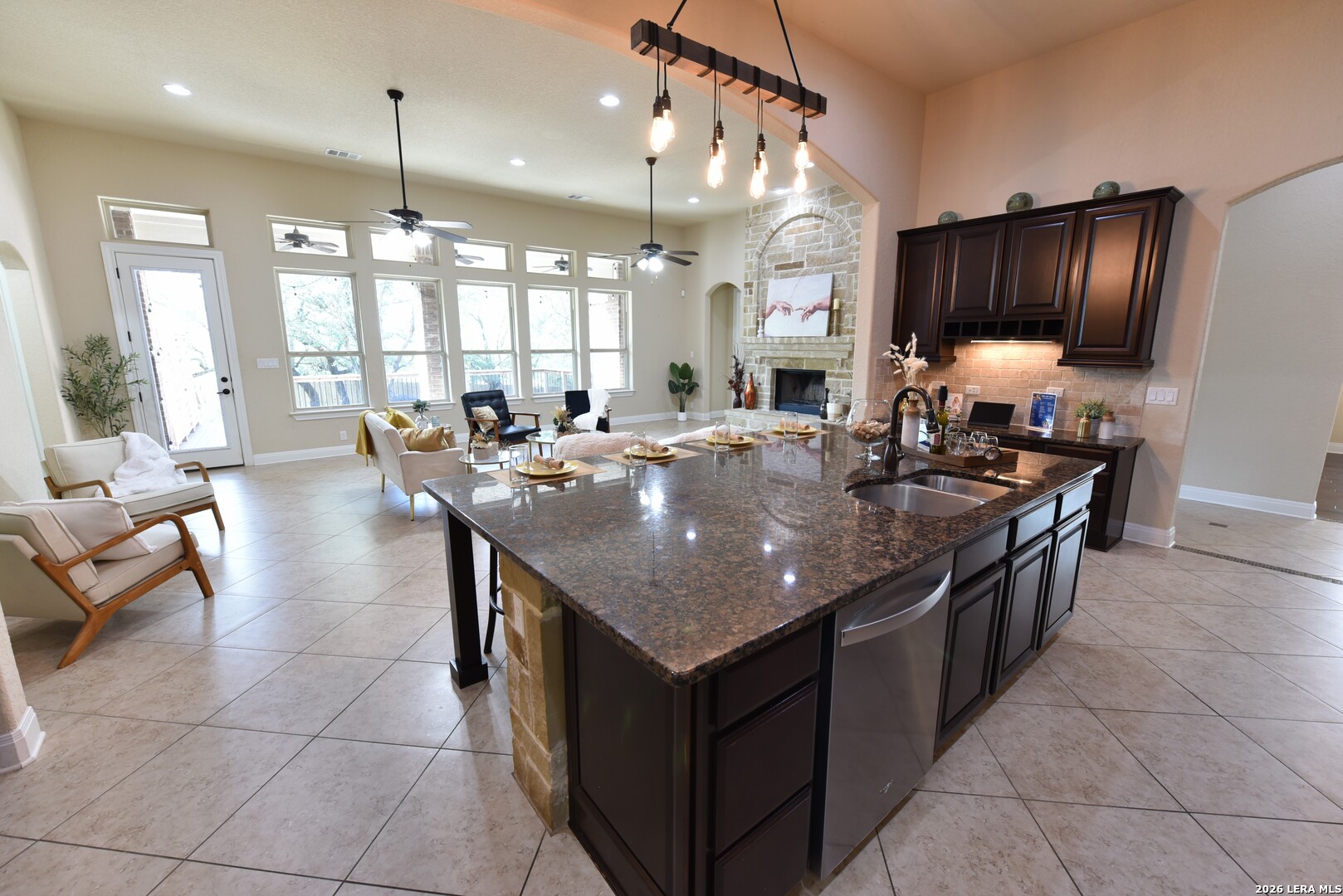 8907 Irving Hill Fair Oaks Ranch, TX 78015 - Photo 9 of 42 a kitchen with stainless steel appliances granite countertop a stove and a refrigerator