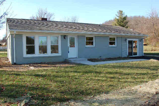 889 Augusta Farms Road Stuarts Draft, VA 24477 - Photo 1 of 10 a house view with a garden space